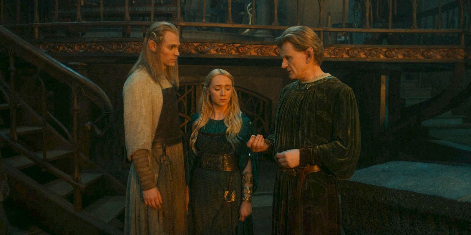 Annatar, Celebrimbor, and Miriel looking at a ring in a forge in The Lord of the Rings: The Rings of Power season 2 episode 5