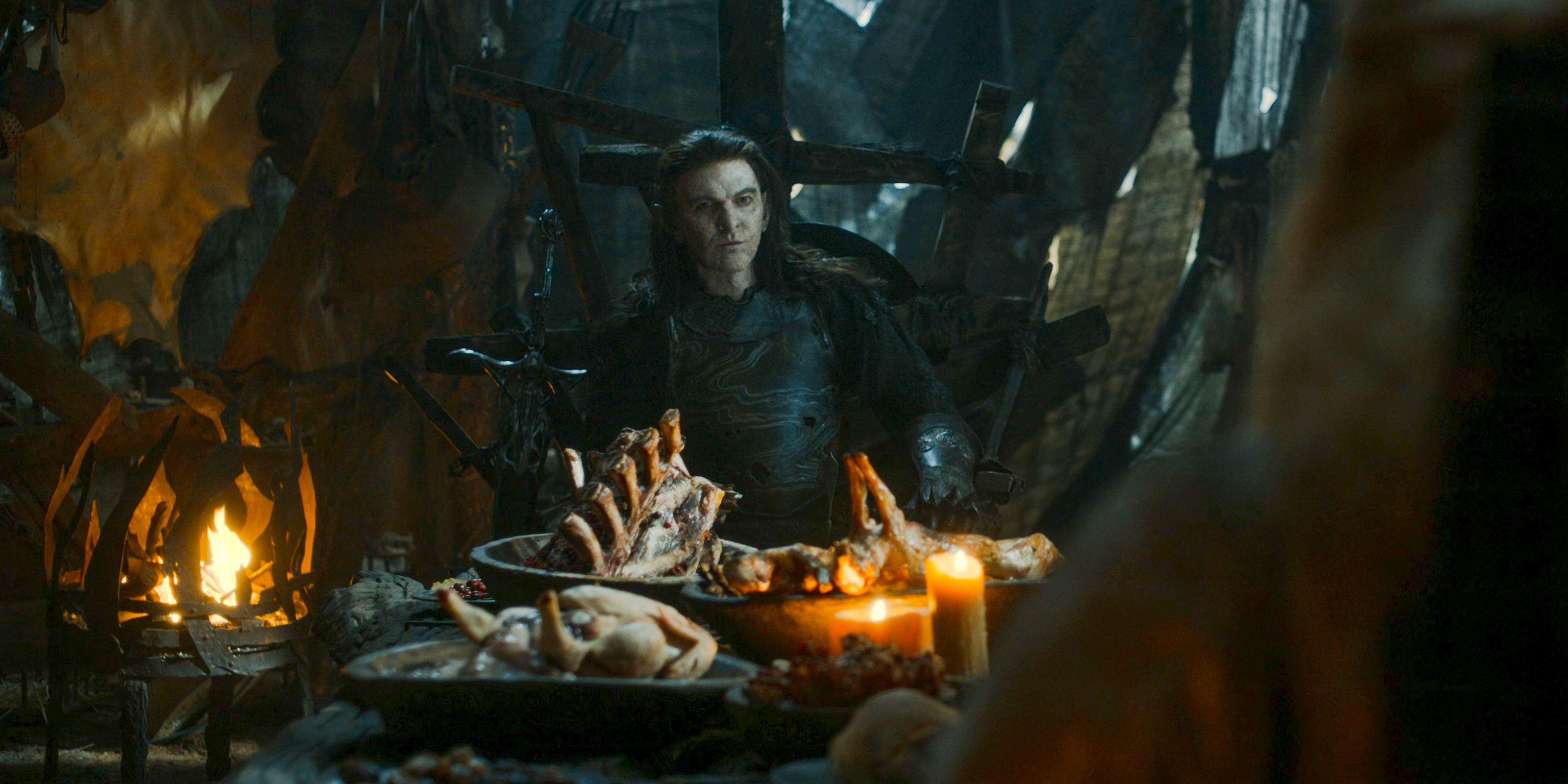 Adar (Sam Hazeldine) dining with Galadriel in The Lord of the Rings: The Rings of Power Season 2 Episode 6