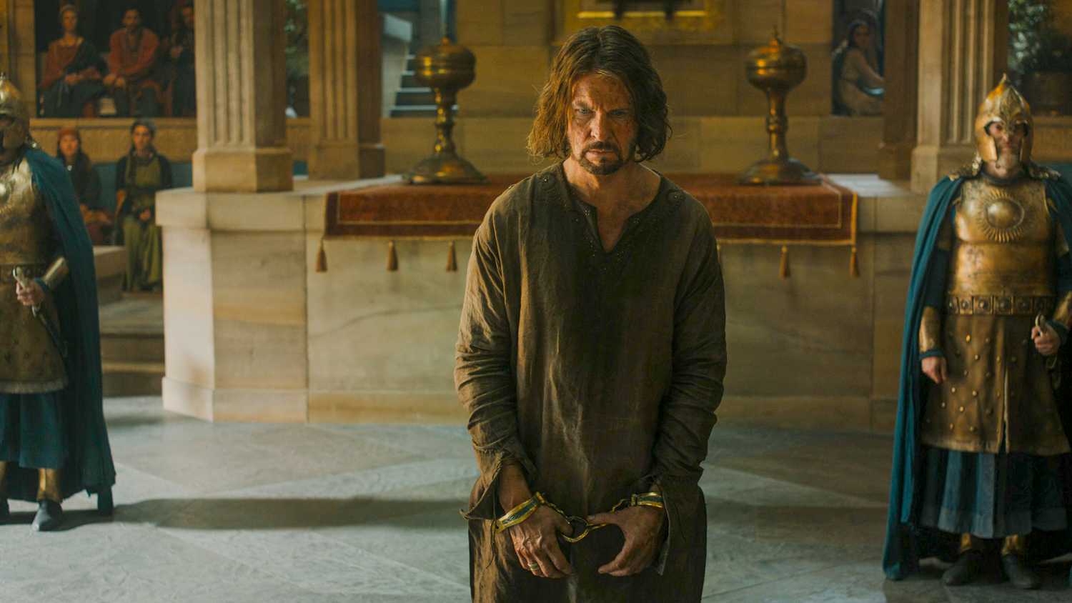 Elendil (Lloyd Owen) in handcuffs in The Lord of the Rings: The Rings of Power Season 2 Episode 6