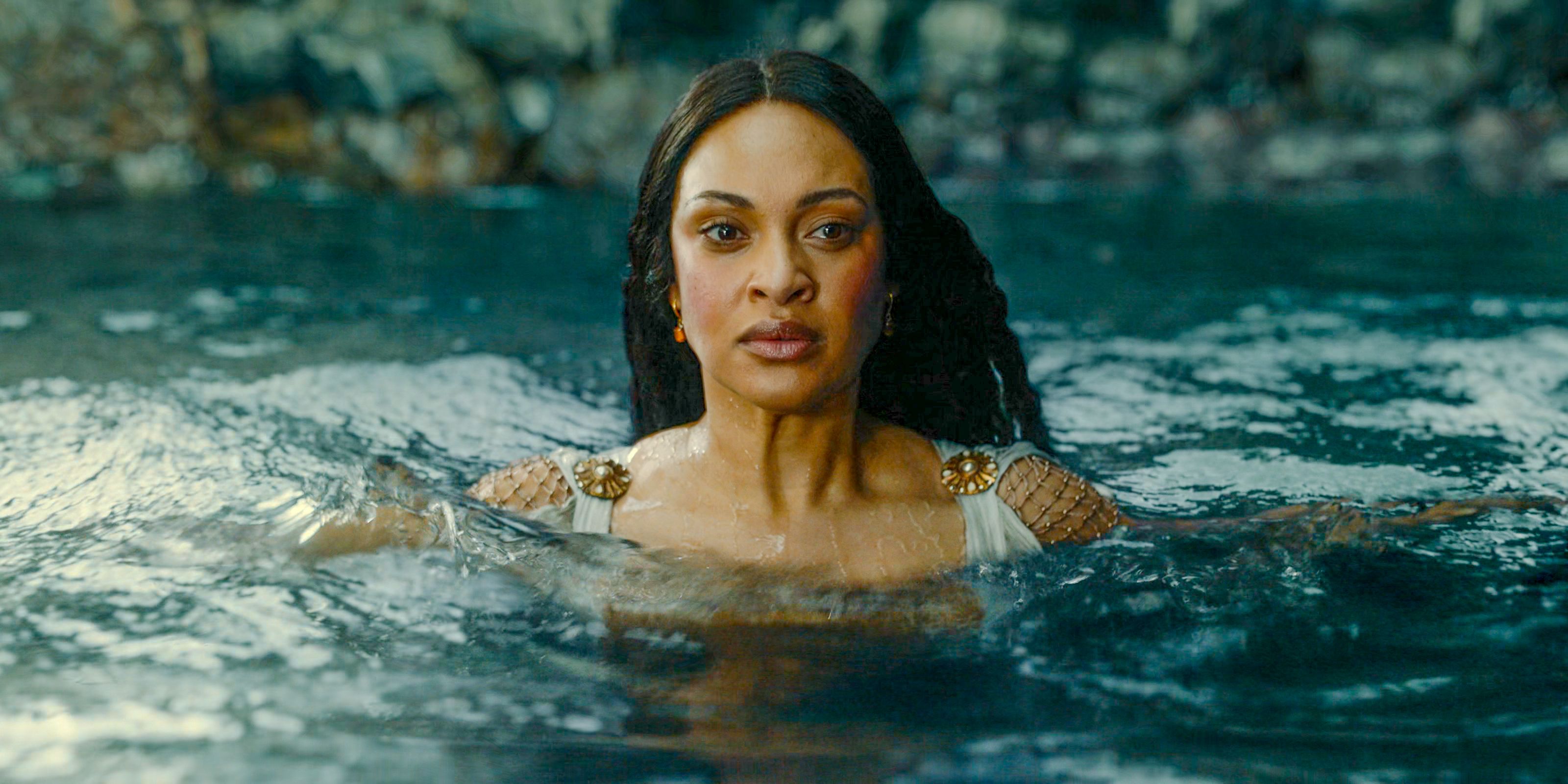 Míriel (Cynthia Addai-Robinson) entering the ocean to face the Valar's judgment in The Lord of the Rings: The Rings of Power Season 2 Episode 6