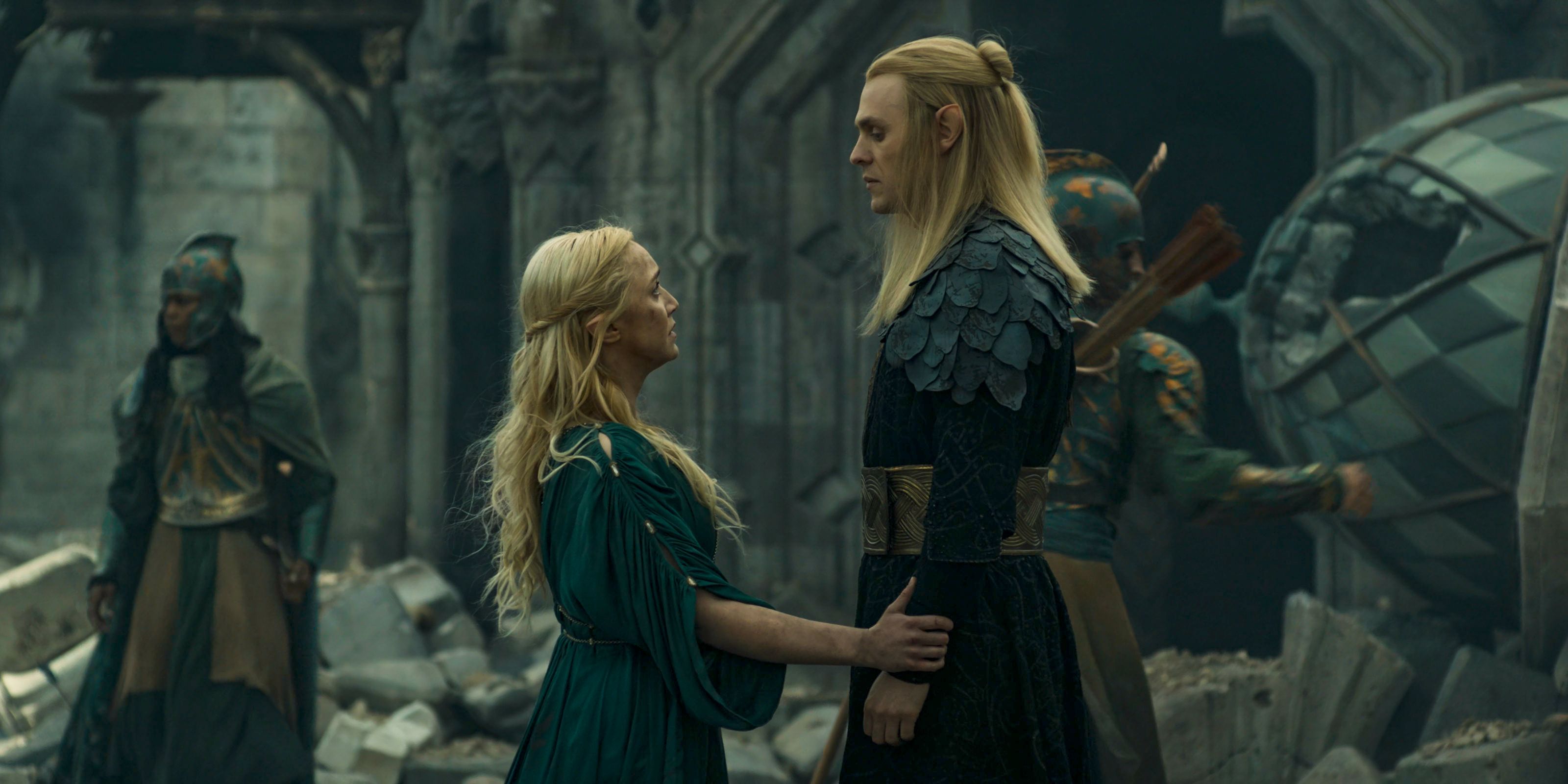 Mirdania (Amelia Kenworthy) looking at Sauron (Charlie Vickers) with anguish over the destruction of Eregion in The Lord of the Rings: The Rings of Power Season 2 Episode 7