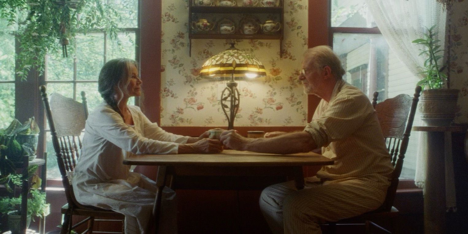 Ed Begley Jr as Frederick and Barbara Hershey as Genevieve sitting at the breakfast table in Strange Darling