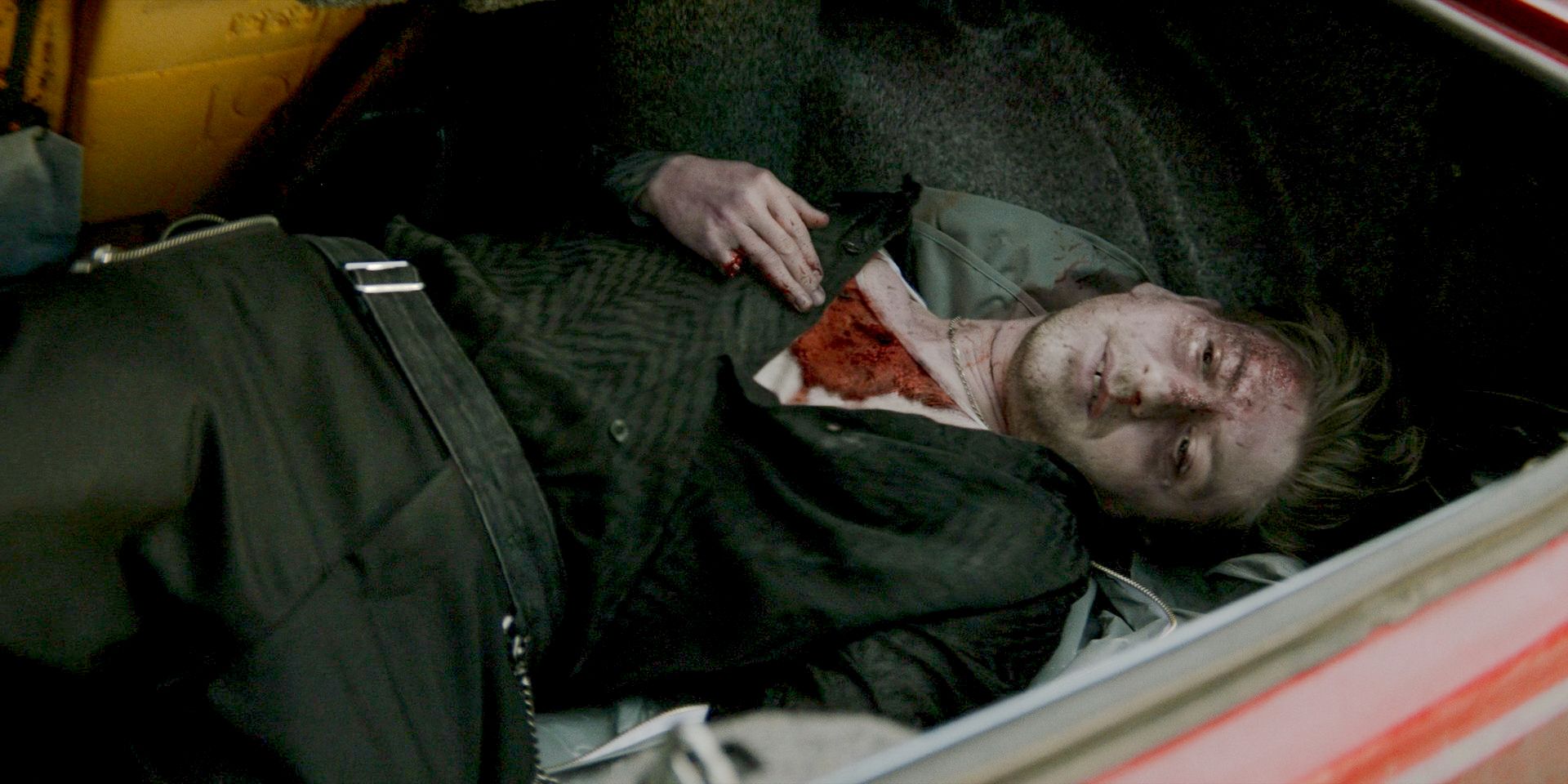 The body of Alberto Falcone (Michael Zegen) in the trunk of a car in episode 1 of season 1 of The Penguin