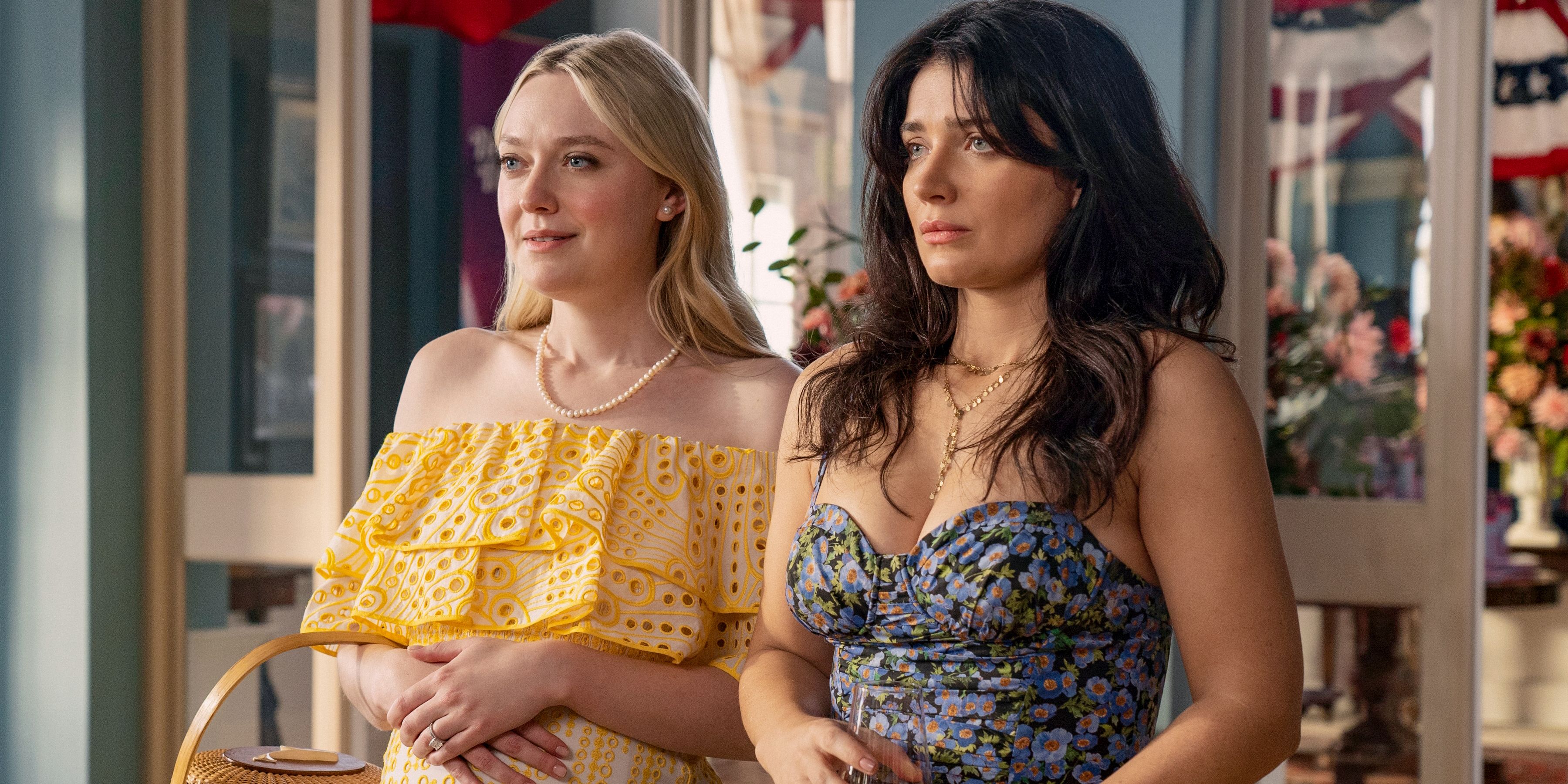 Abby Winbury (Dakota Fanning) and Amelia Sacks (Eve Hewson) looking at something in surprise in The Perfect Couple