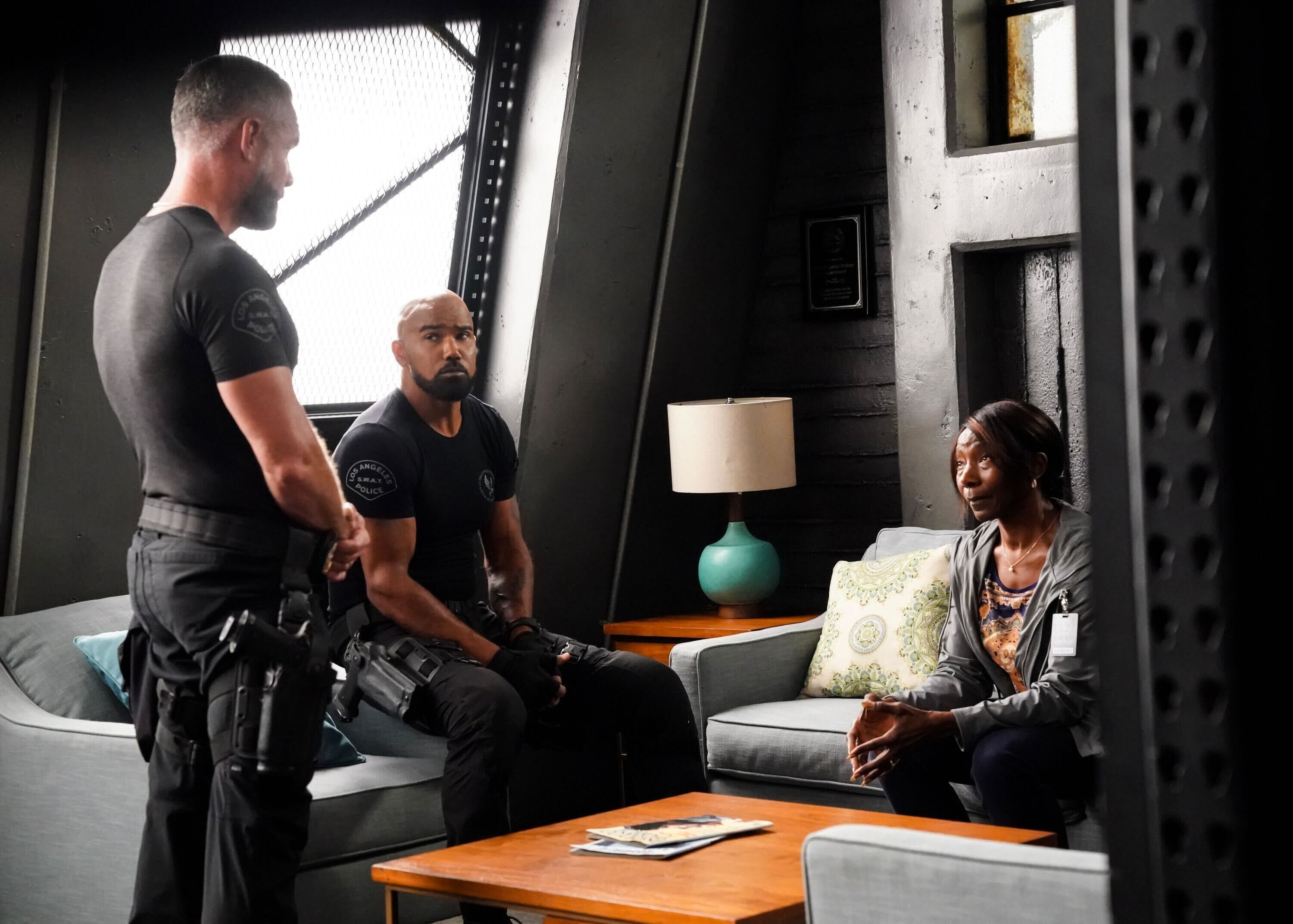 Three characters having a conversation in SWAT season 8, episode 1