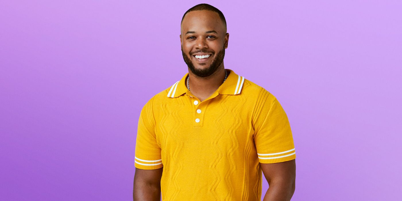 love is blind season 7 Tim Godbee in a yellow t-shirt looking excited