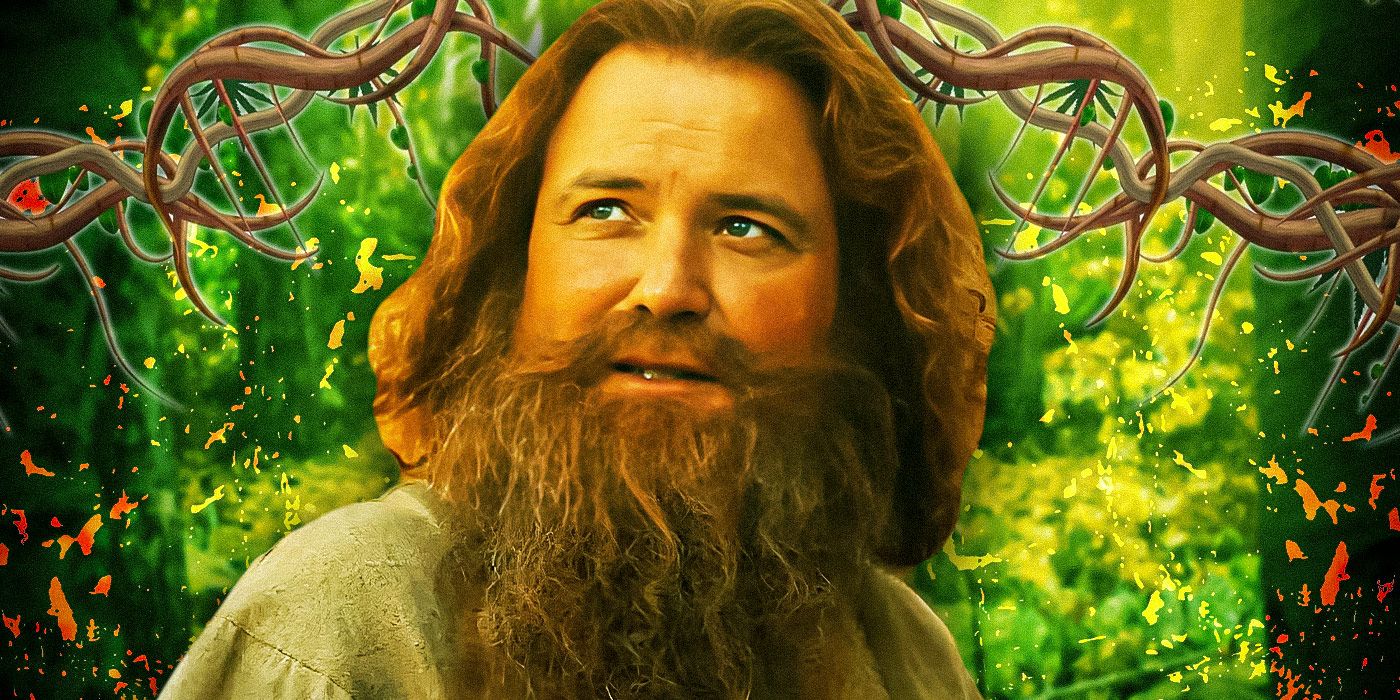 Rory Kinnear as Tom Bombadil smiling up at someone in The Rings of Power and trees and vines as a background