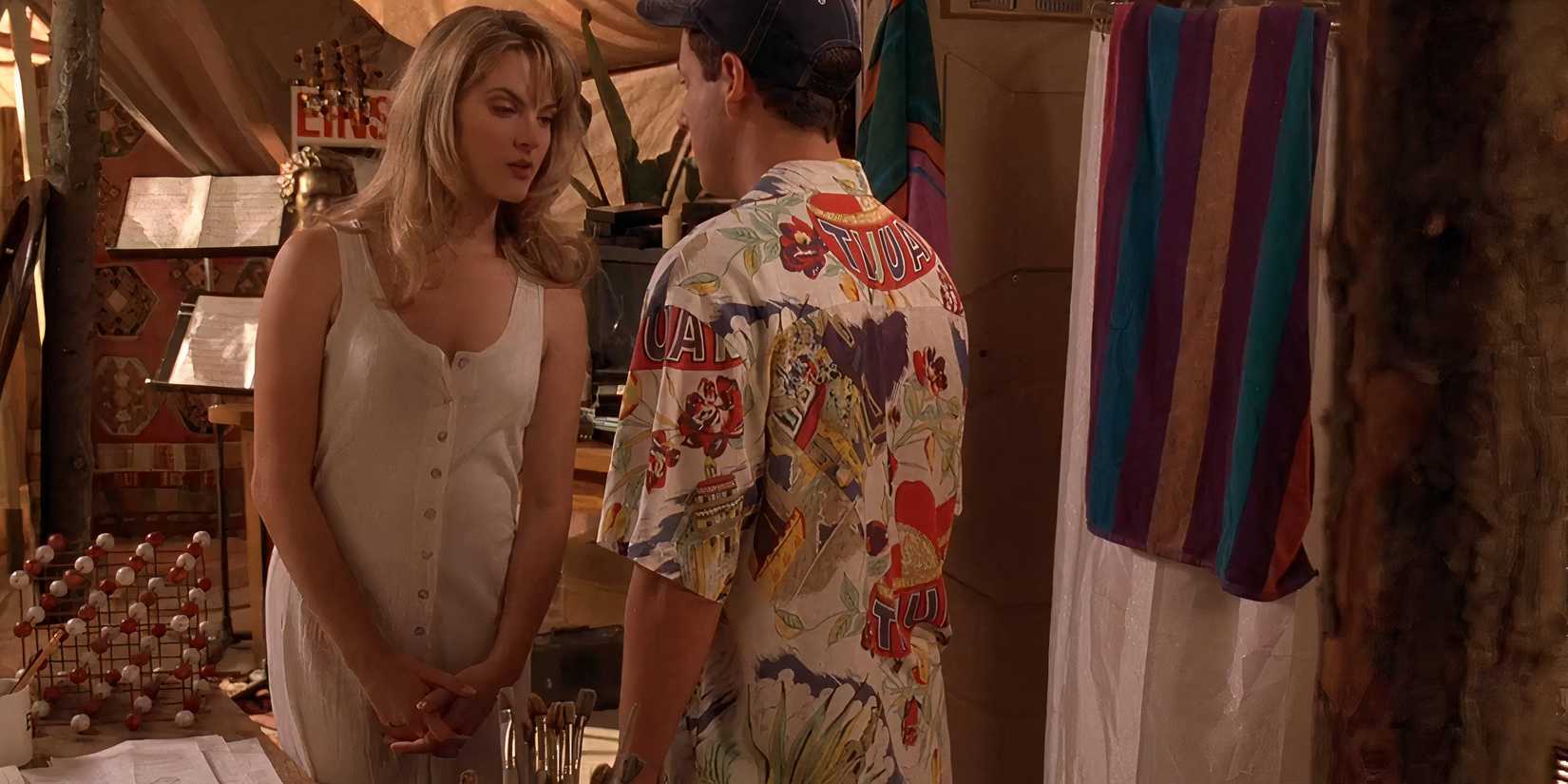 Billy (Adam Sandler) and Veronica (Bridgette Wilson) flirting in Billy's garden tent in Billy Madison.