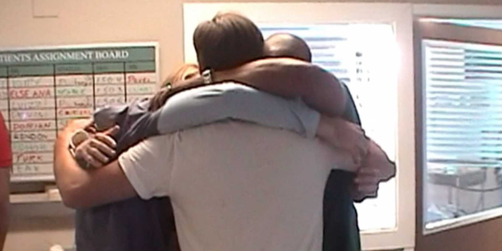 Bill Lawrence hugging the cast of Scrubs