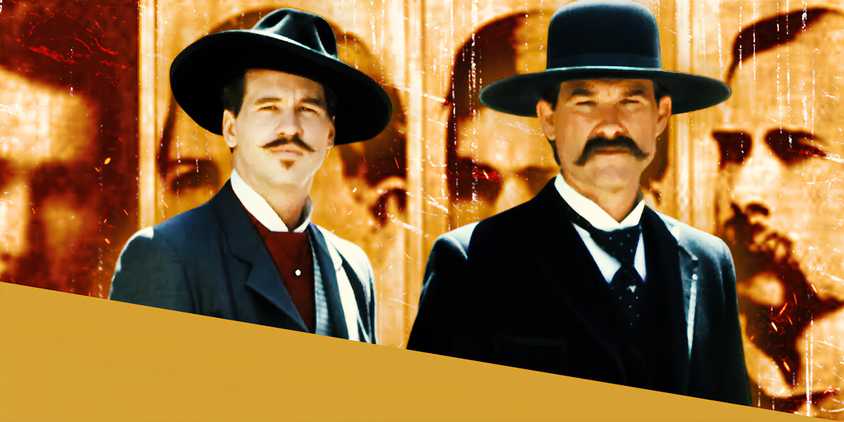 Val Kilmer and Kurt Russell in Tombstone in Front of Old Photographs