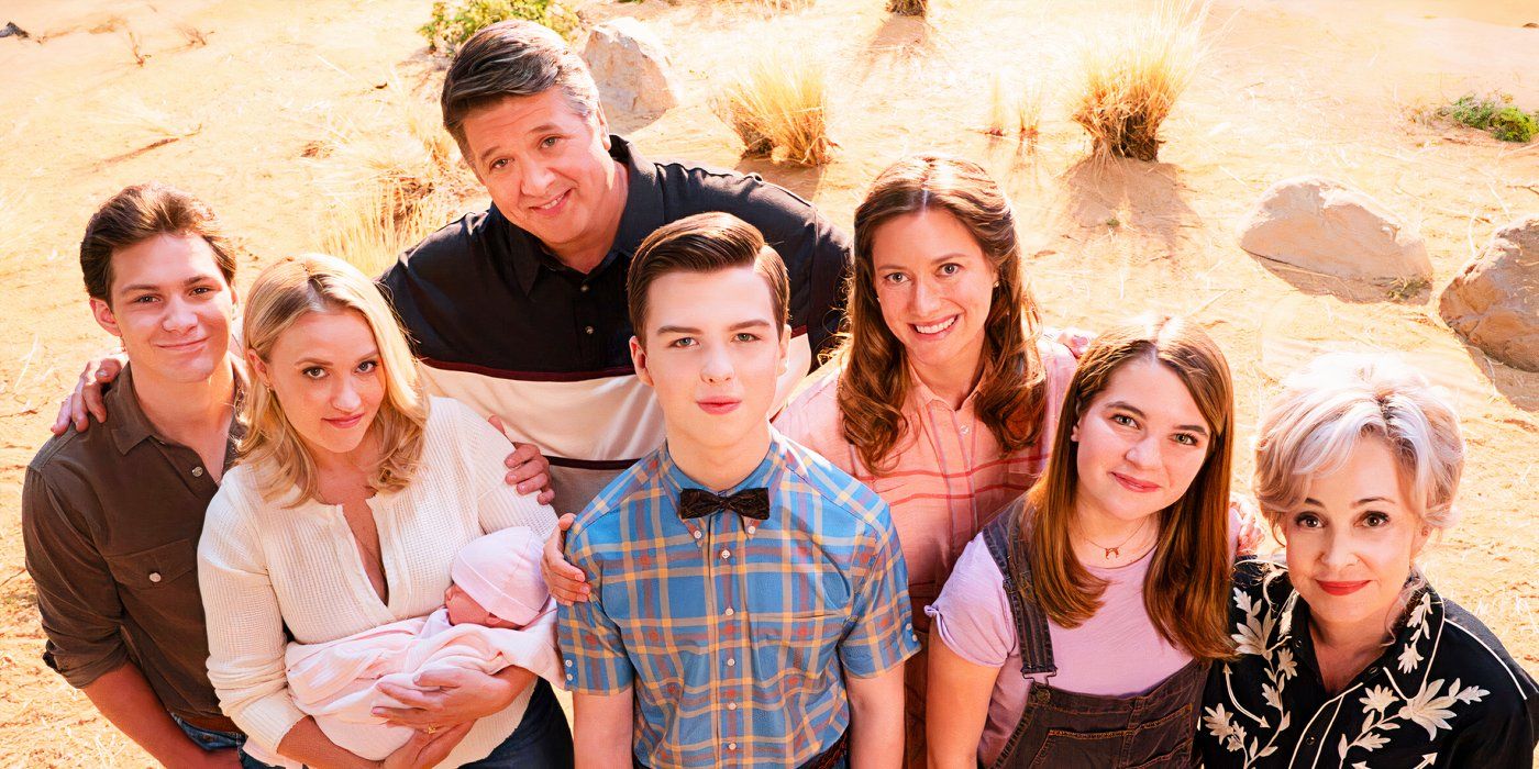 The Cooper family standing together and smiling up at the camera for Young Sheldon season 7