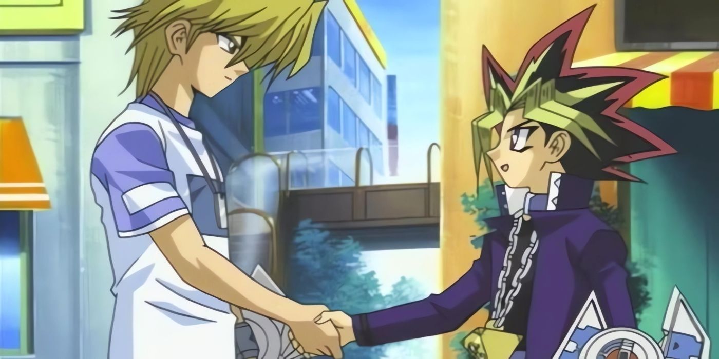 Yugi and Joey shaking hands and promising to duel for ownership of Red-Eyes in the future.