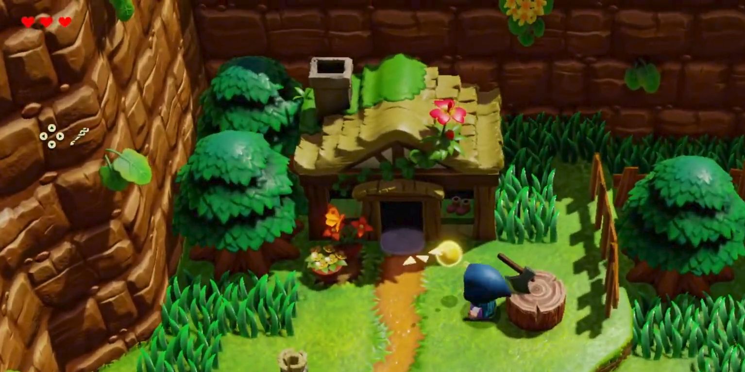 Zelda parada afuera de la casa de Link, una pequeña cabaña de troncos ubicada contra un acantilado, en Echoes of Wisdom.