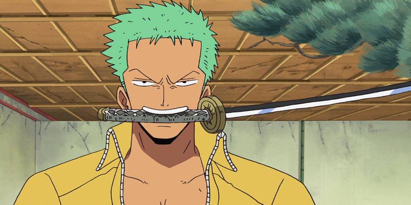 Zoro holding his sword with his teeth in One Piece 289