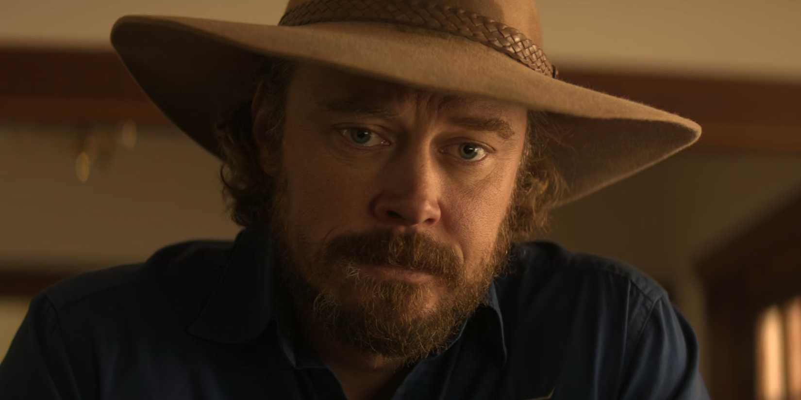 Michael Dorman frowning as Graham Lawson in Territory