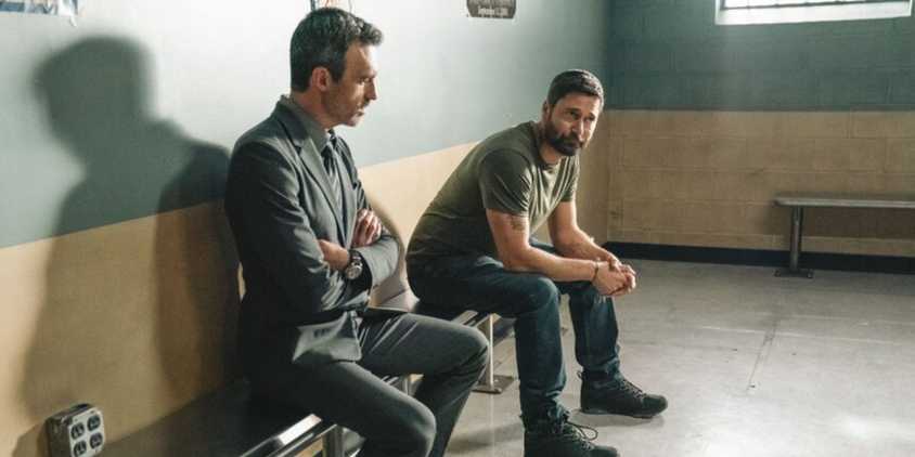 Law & Order Vince visits Matt on a bench outside the holding cells