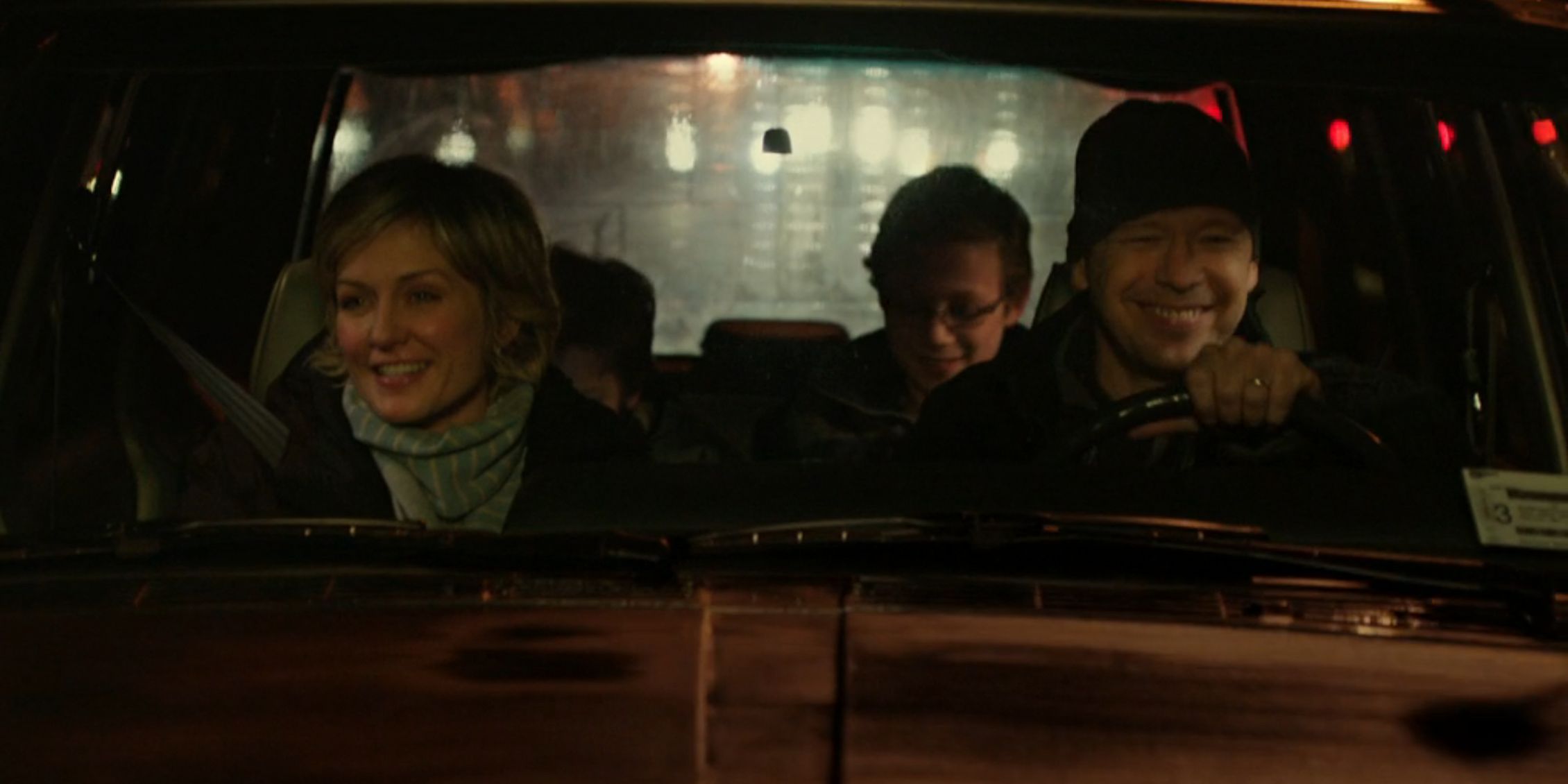 Blue BLoods Danny driving Linda and the boys home on a dark night