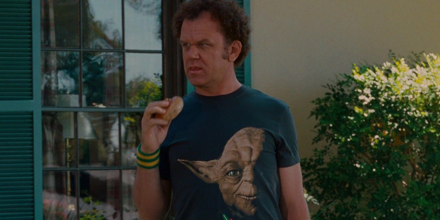 Dale (John C. Reilly) eating out in the lawn in Step Brothers