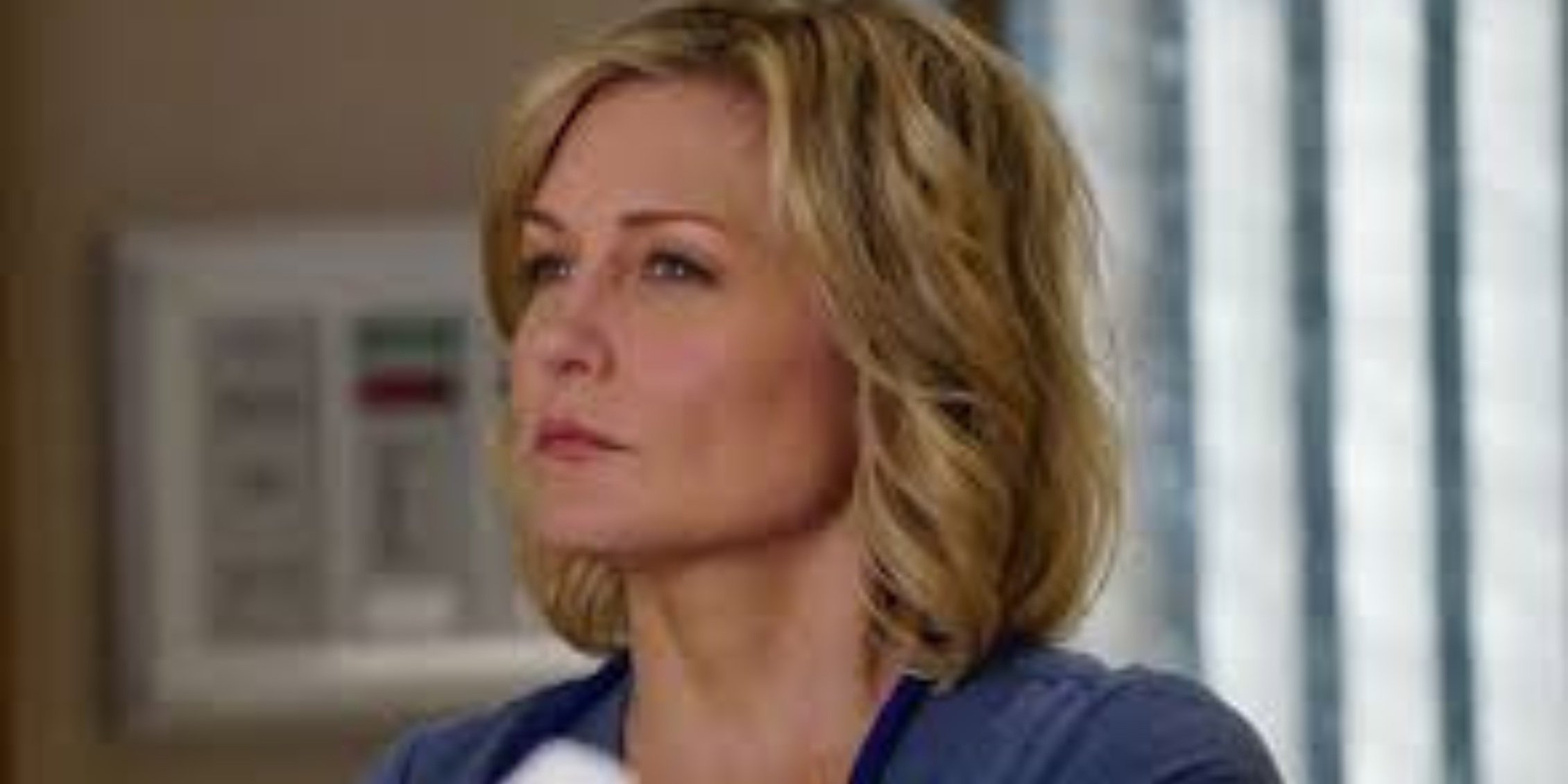 Blue Bloods Linda standing in the hospital and looking upset