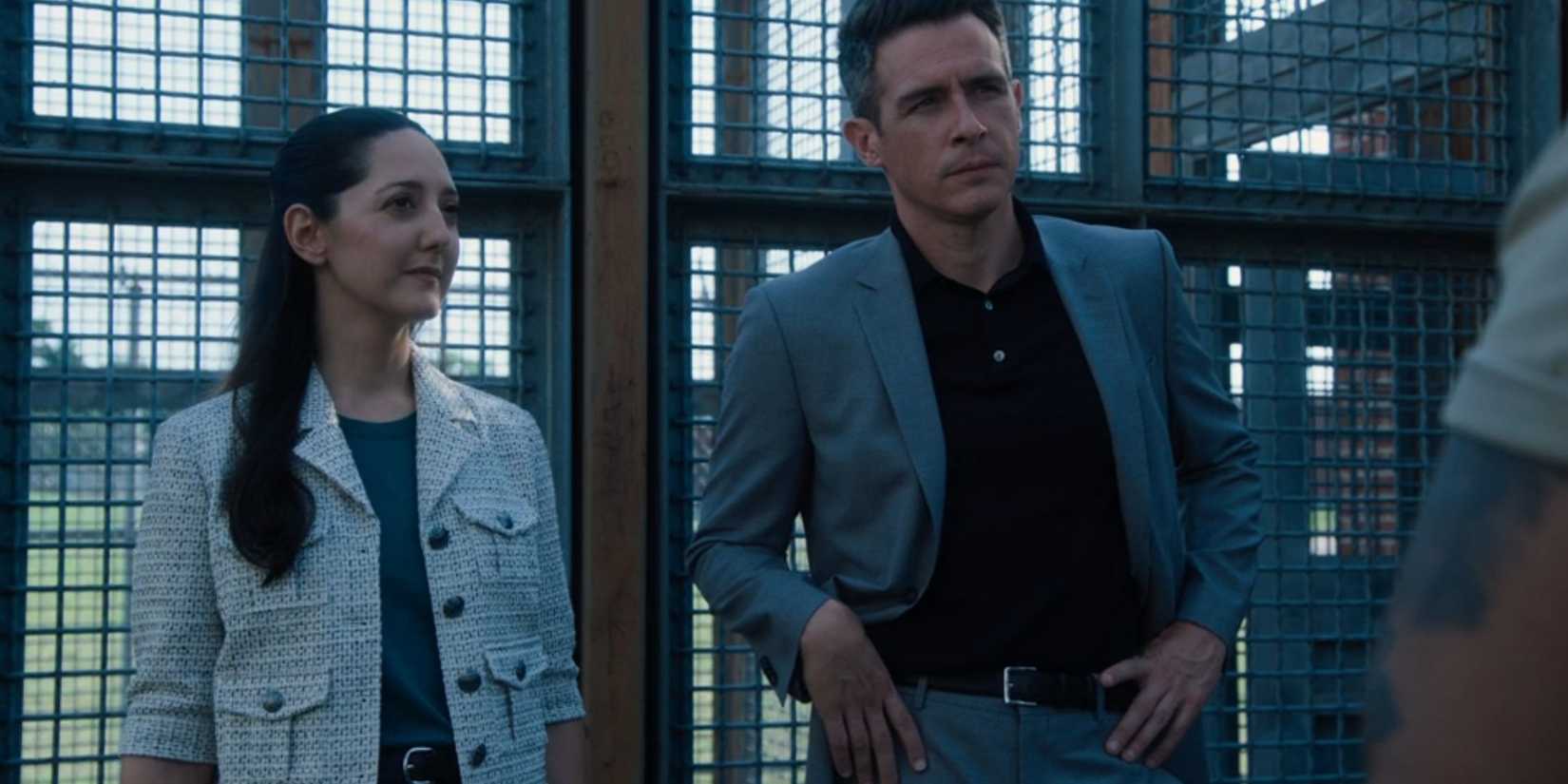 FBI Sofia and Scola stand in an enclosure talking to a witness