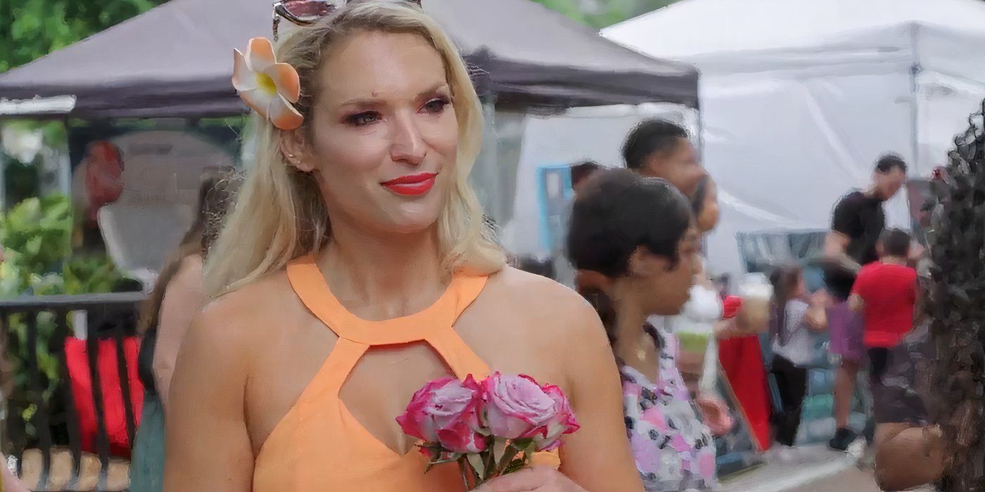 90 Day Fiancé Vanja Grbic holding pink roses in orange dress smiling