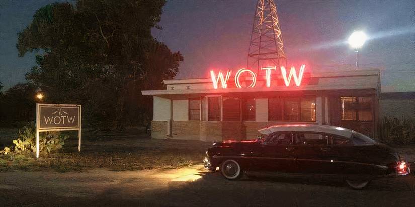 a 1950s car in front of a radio station in The Vast of Night