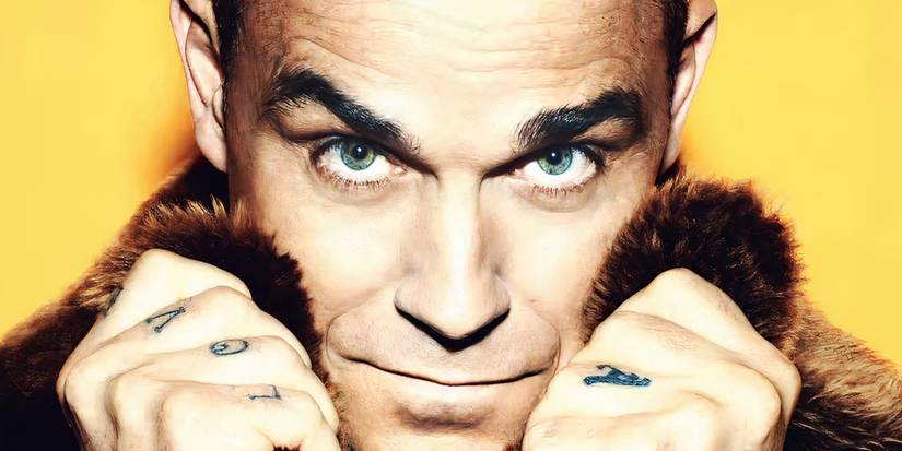A still image of Robbie Williams in a Fur Coat from the Better Man trailer