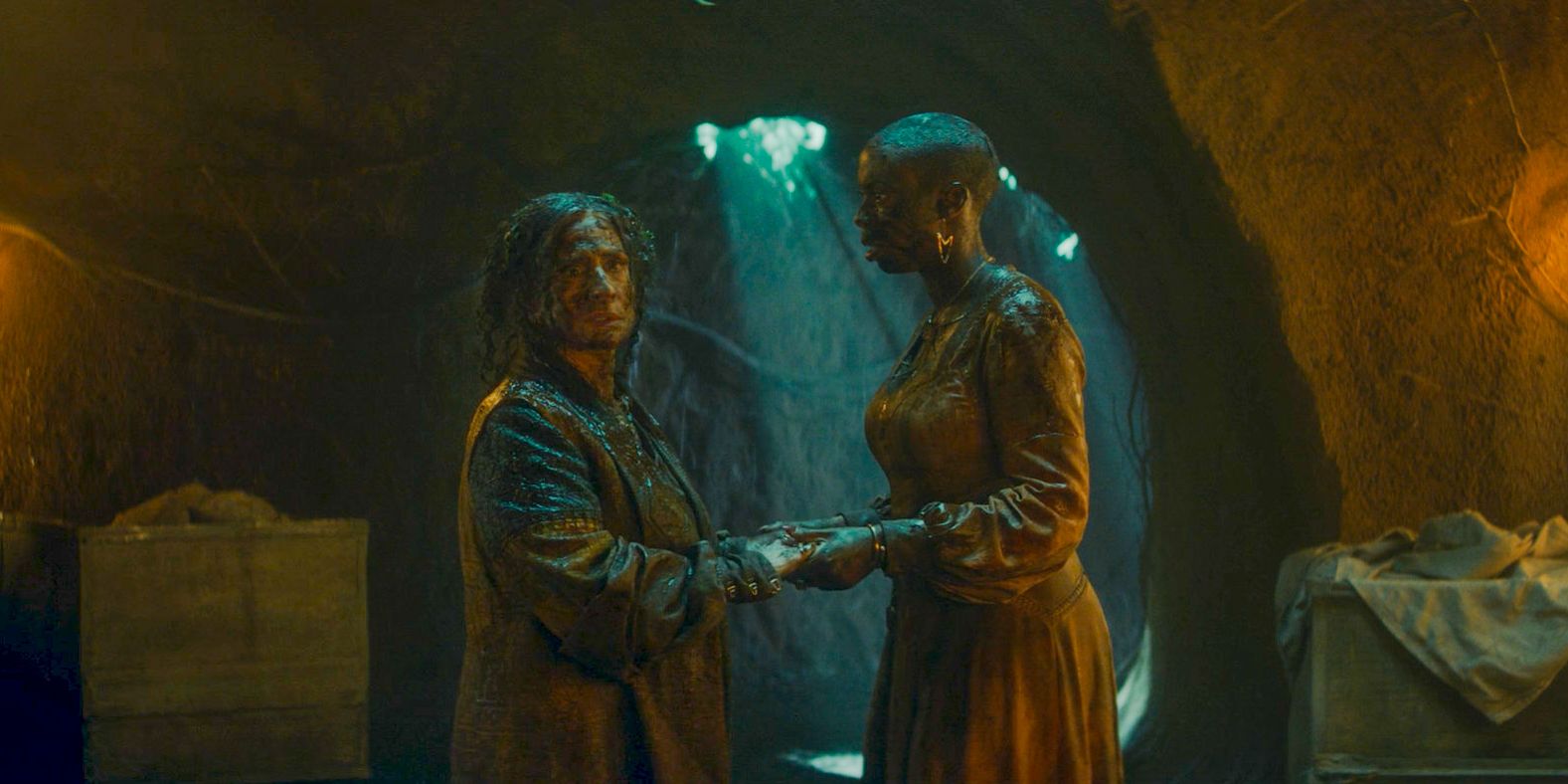 Lilia (Patti LuPone) and Jennifer (Sasheer Zamata) in a tunnel after leaving the witches road in Agatha All Along Season 1 Episode 7