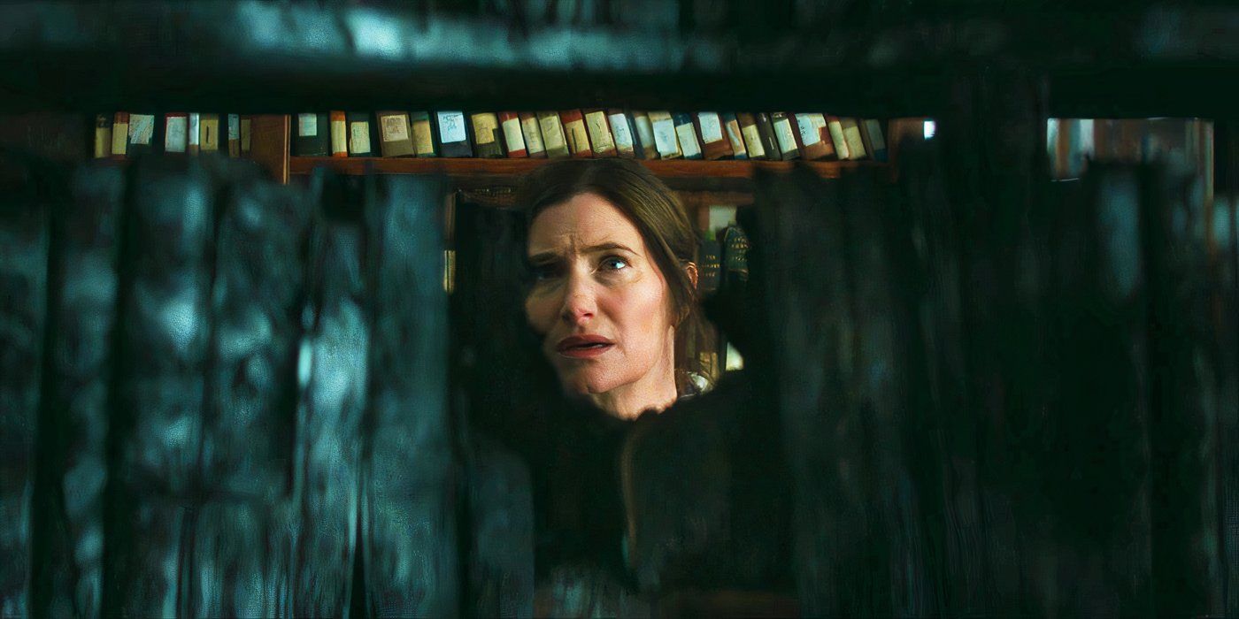 Agnes looking through burnt books in Agatha All Along episode 1