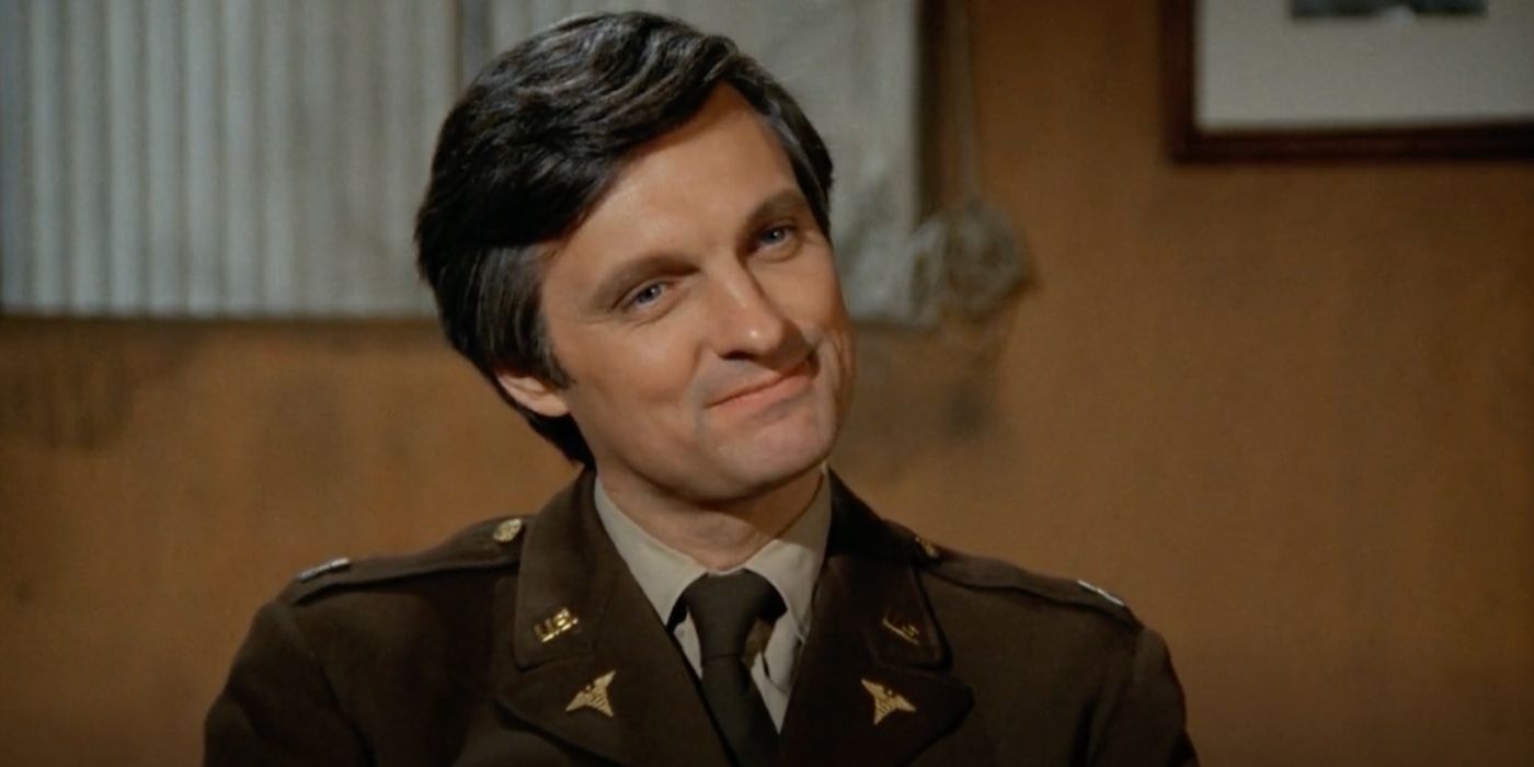 Alan Alda's Hawkeye smirking in MASH season 4 episode "The Novacaine Mutiny"