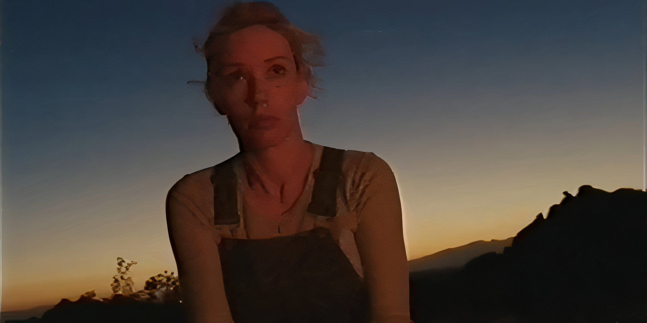 Alanah Pearce as Halley looking dejected off in the distance in V/H/S/Beyond