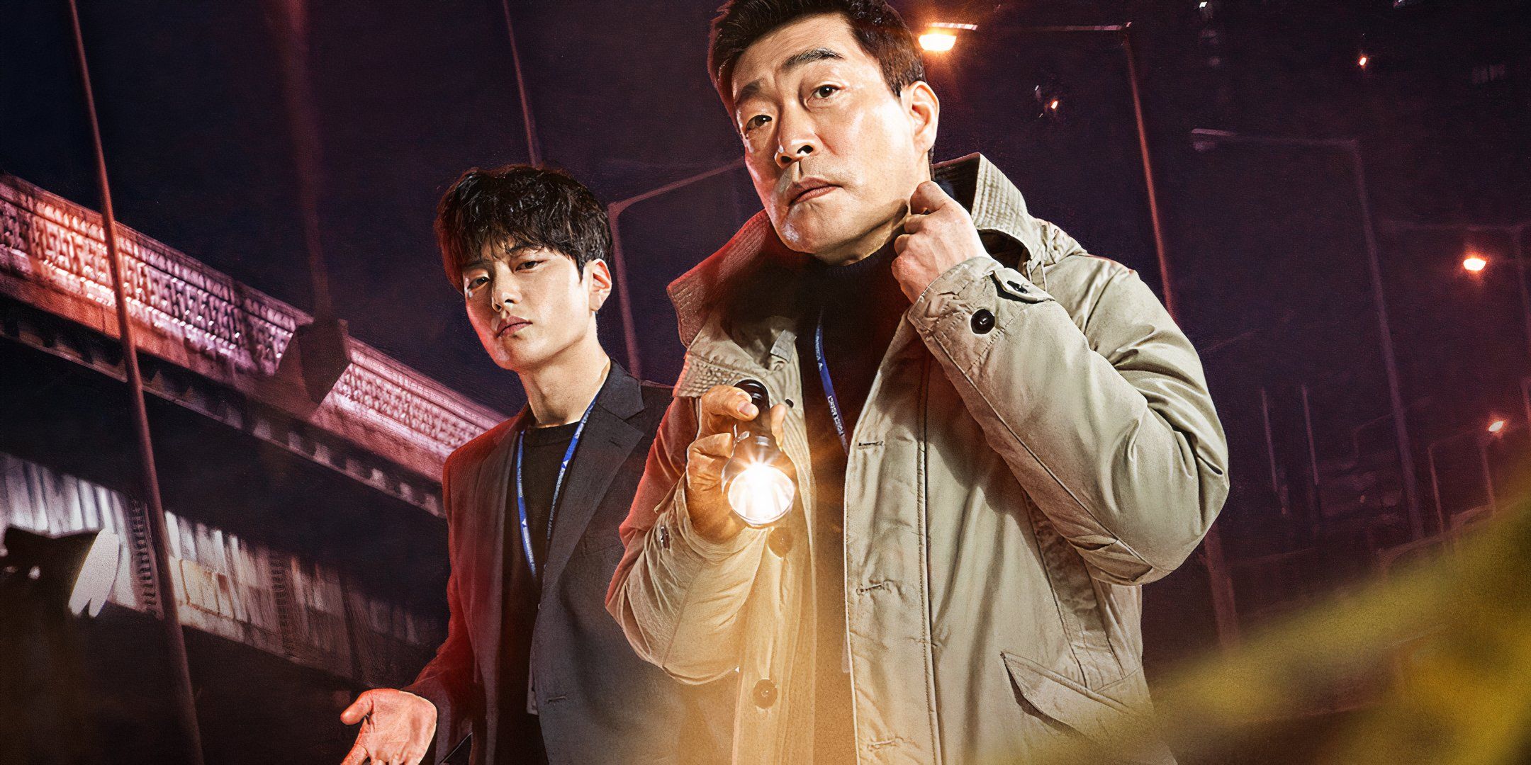 An older man carries a flashlight ahdead of a younger man in the K-drama The Good Detective