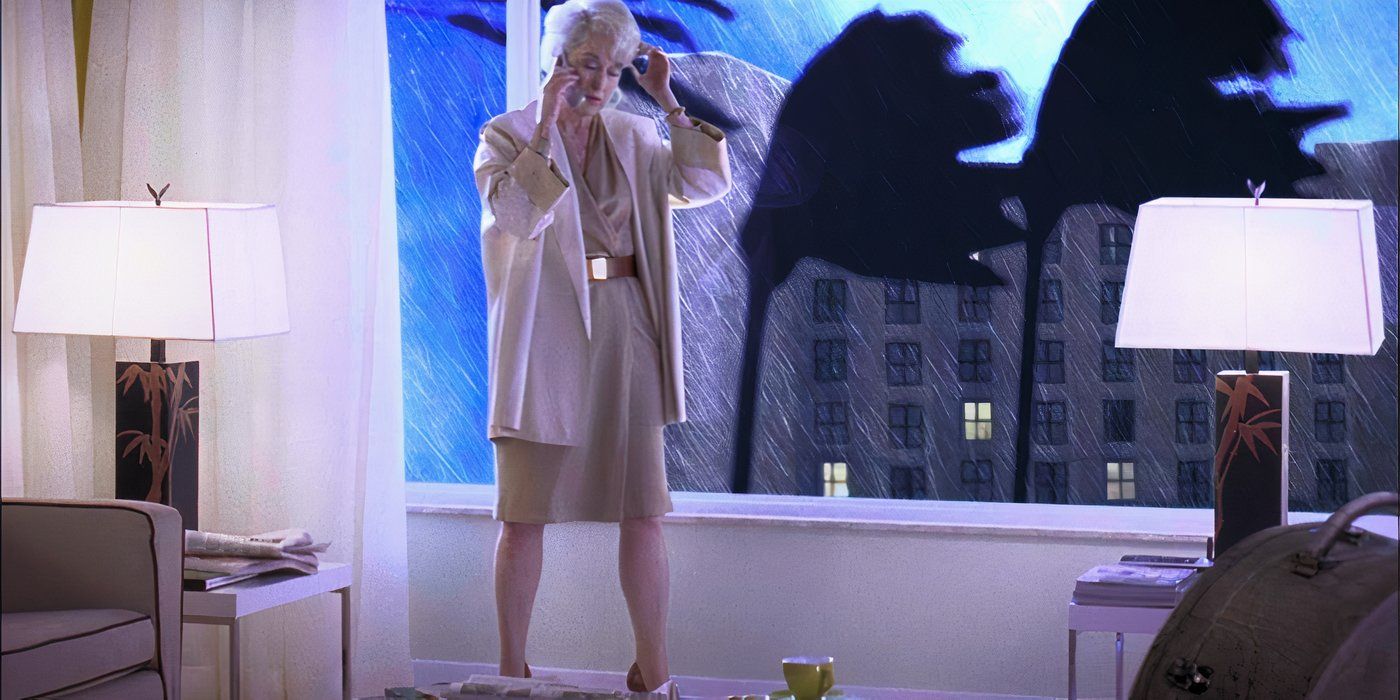 Meryl Streep as Miranda Priestly standing in front of a window with a hurricane outside in The Devil Wears Prada