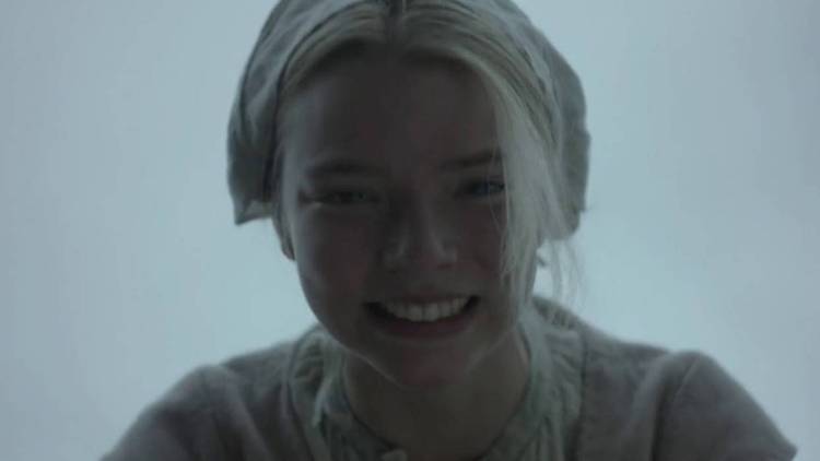Anya Taylor-Joy as Thomasin playing peekabo in The Witch