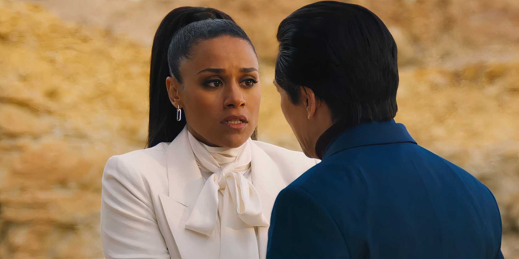 Ariana DeBose as Rose looking worried talking to Marvin in Love Hurts