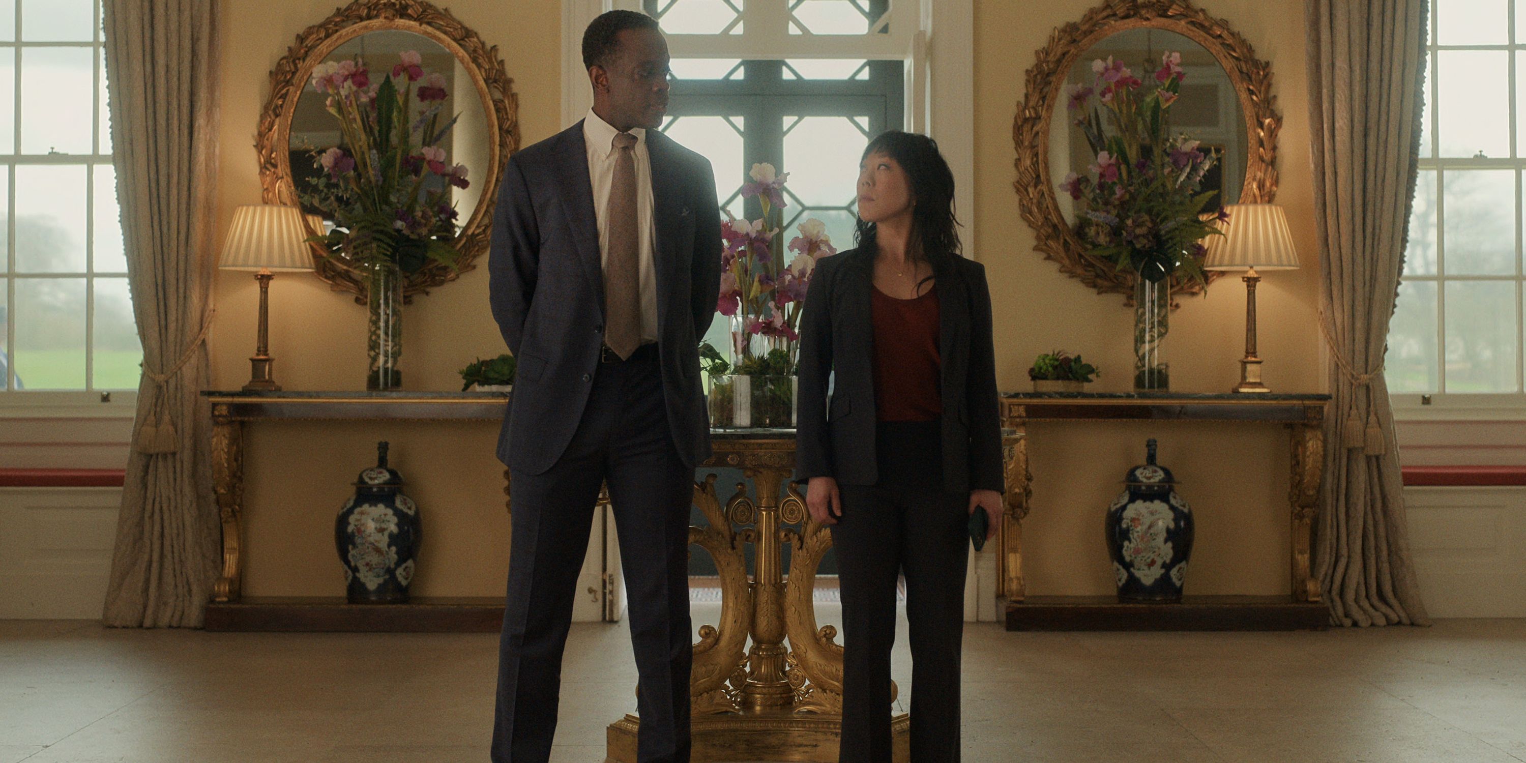 The Diplomat Stars Ali Ahn & David Gyasi Break Down "The Cost Of Doing Business" In Season 2