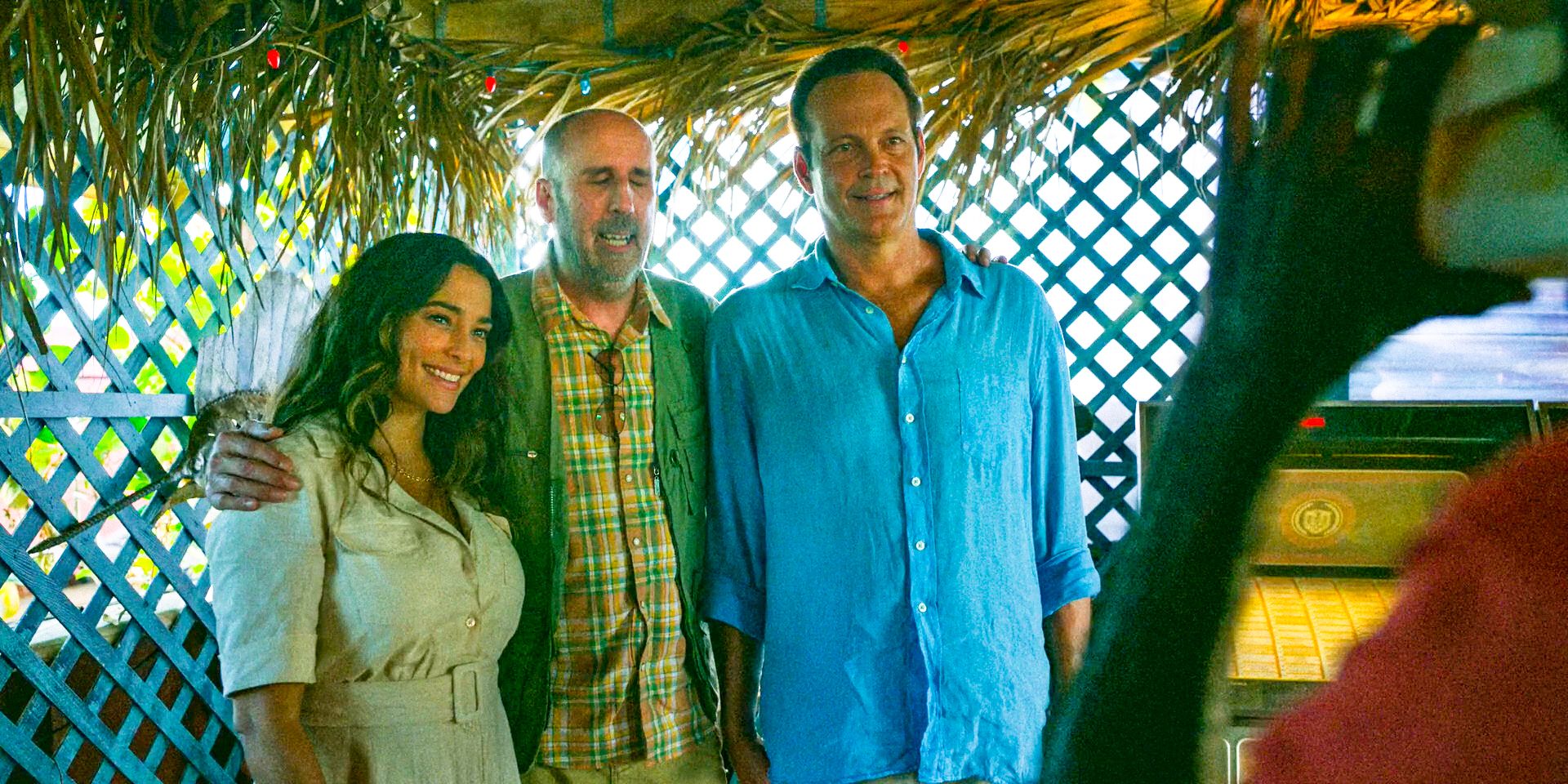 Rosa (Natalie Martinez), KJ Claspers (Bob Clendenin), and Yancey (Vince Vaughn) take a picture in Bad Monkey Season 1 Episode 9