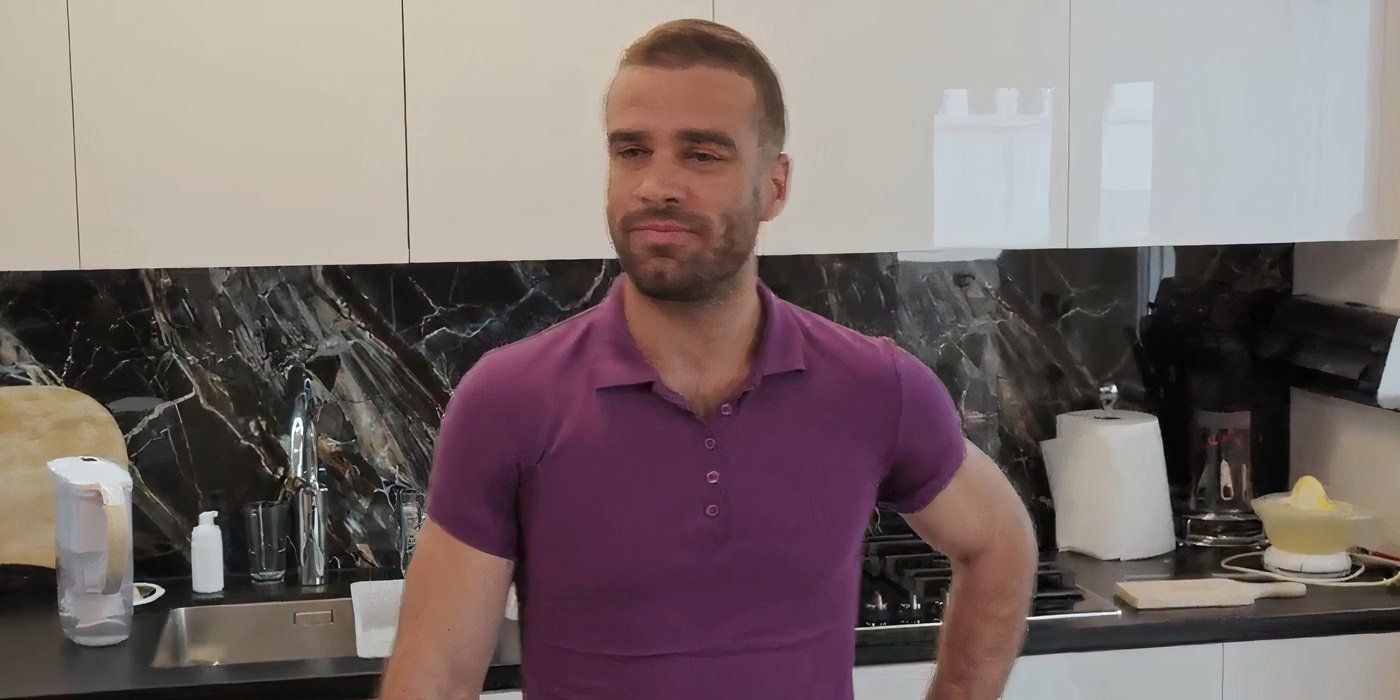 Bozo Vrdoljak in 90 Day Fiance in his kitchen at home in purple shirt