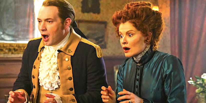 Brandon Scott James's Isaac and Rebecca Wisocky's Hetty looking worried in Ghosts