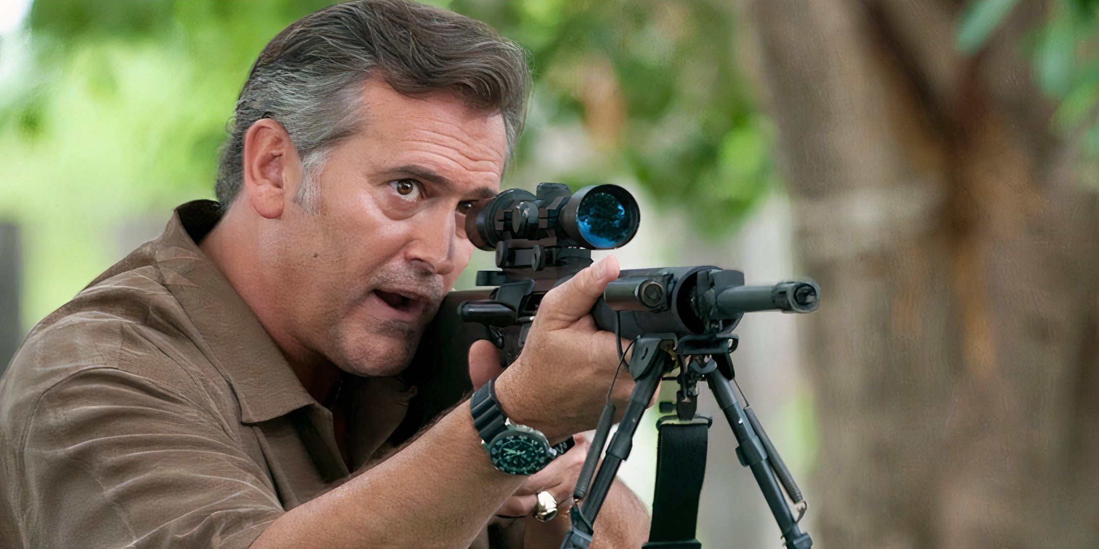 Sam Axe aims a gun. 