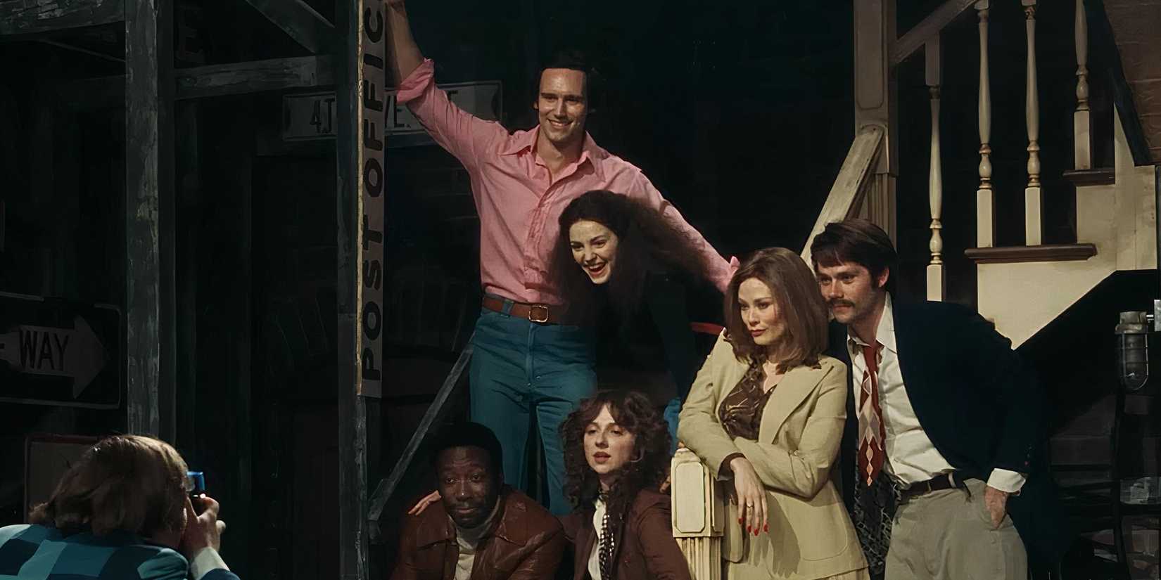 Cast members taking a photo in Saturday Night