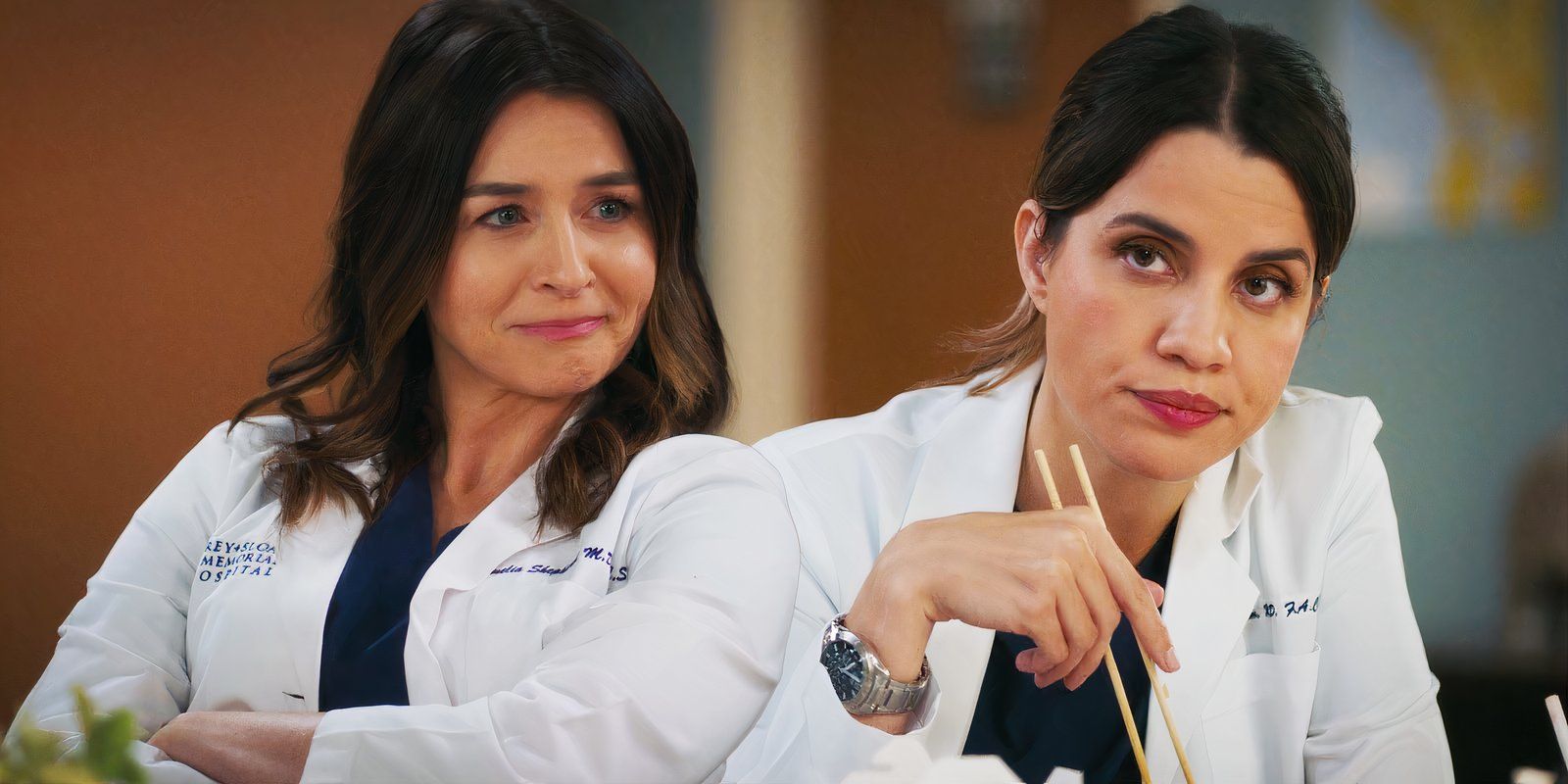 Caterina Scorsone as Amelia Shepherd and Natalie Morales as Monica Beltran in Grey's Anatomy season 21 episode 2