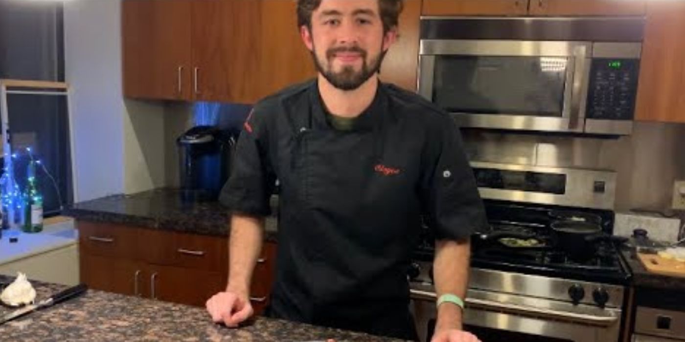 Cloyce Martin in Below Deck Sailing Yacht at a marble countertop smiling at camera