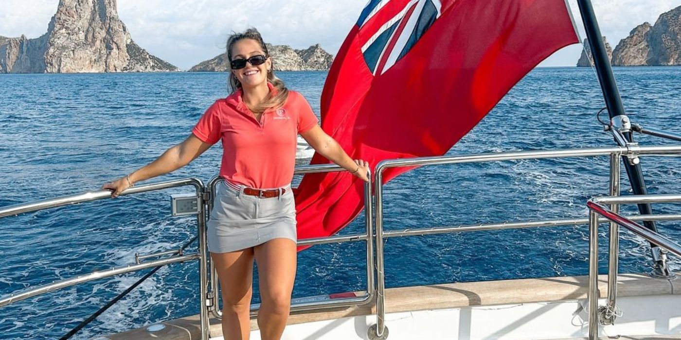 Danni Warren on Below Deck Sailing Yacht posing on boat