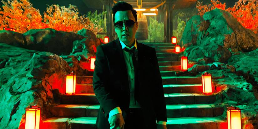 Donnie Yen leaning on his sword as Caine in John Wick 4