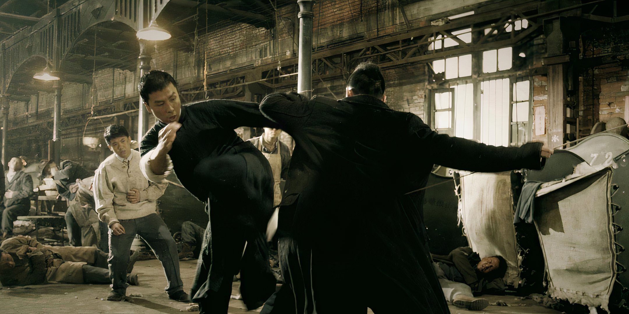 Donnie Yen fights opponents. 