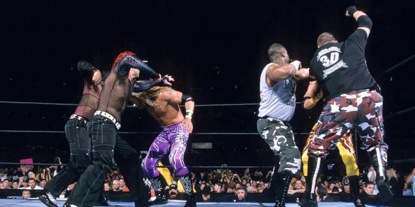 Edge and Christian The Hardy Boyz and The Dudley Boyz brawl in TLC II for the WWE Tag Team Titles at WrestleMania X-Seven