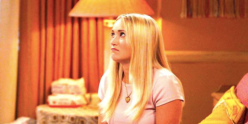 Emily Osment's Mandy sits on a bed looking glum in Georgie & Mandy's First Marriage