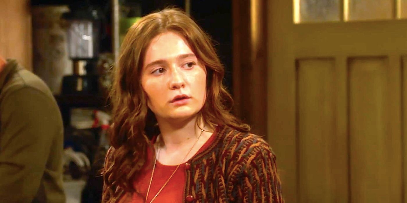 Emma Kenney's Harris looking surprised in a garage from The Conners season 1