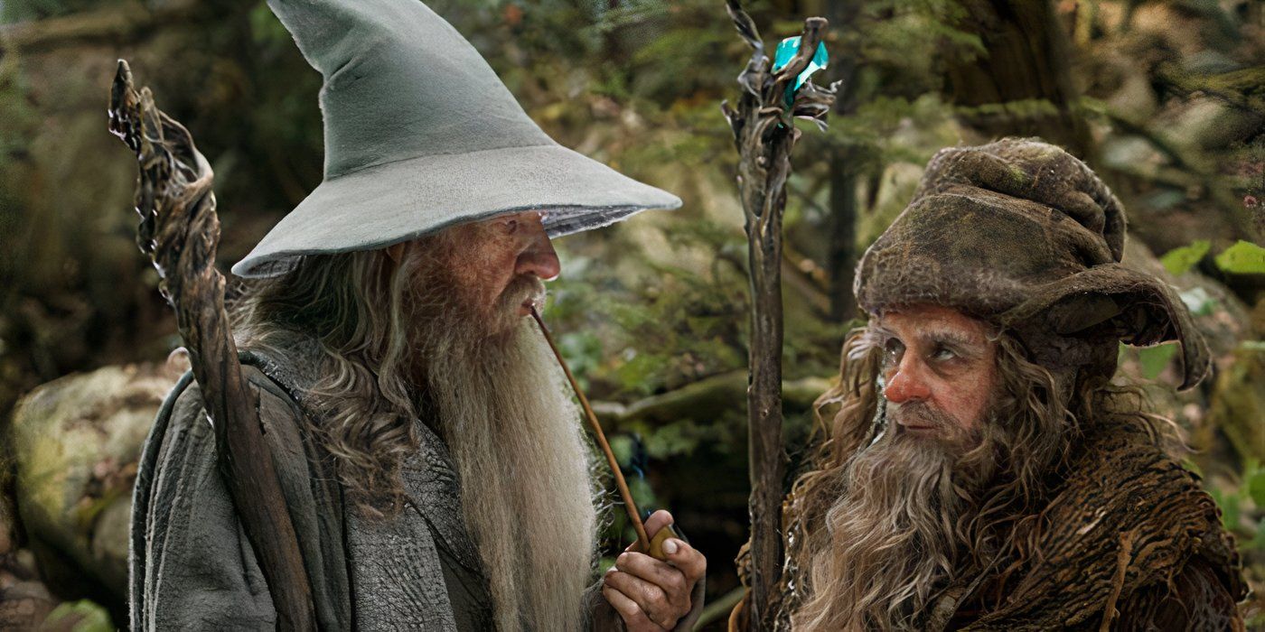 Gandalf and Radagast standing holding their staffs in The Hobbit (2012).